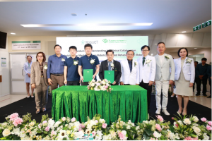 Representatives from RoboCT and Ladprao General Hospital pose for a group photo during the MOU signing and launch of the Ladprao Robotics Rehabilitation Center in Bangkok.