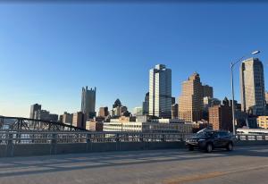Pittsburgh's housing market posted a 5.8% year over year price gain through early 2026, ranking among the top five nationally according to the American Enterprise Institute. Alt text: Pittsburgh downtown skyline viewed from a bridge showing the city cente