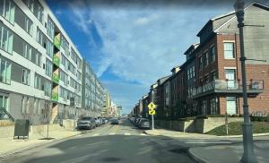 Urban residential street showing new housing development representing the broader U.S. housing market in 2026
