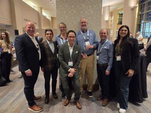 Group photo of SIG team receiving award from Ellucian