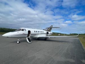 Business Air private jet charter Texas midsize aircraft on ramp
