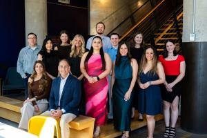 Group photo of the 316 Strategy Group team posing indoors after receiving Top Branding and Design Service 2026 recognition from Retail Business Review Magazine.