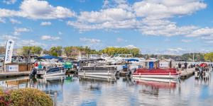 Boats lined up at the dock at Nautical Boat Club Irmo on Lake Murray, prepared for members