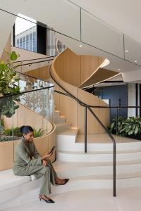 steps in terrazzo at the base of spiral  staircase.
