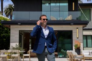 Exterior view of a modern luxury beachfront home listed by Ray Lyon Realty Group in Santa Monica.