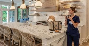 Nurse enjoying kitchen she bought with nurse discount at CabinetSelect.com