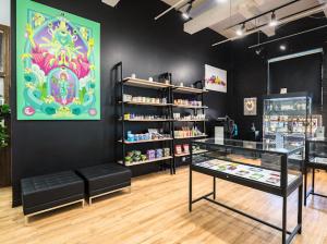 Simply Crafted dispensary with custom Chuck U painting on display