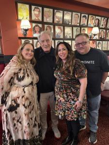 VIP Ignite Co-Founders Alycia Kaback and Sir Michael Fomkin pose with President of Talent Development Deneen White and acclaimed writer and comedian Alan Zweibel at the iconic Sardi's restaurant in New York City, surrounded by the venue's legendary wall o