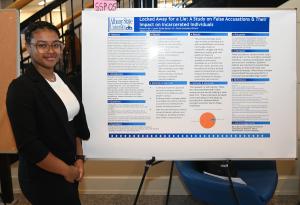 C-yanni Outen (Best Overall Oral Presentation) With Her Research