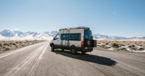 altCamp luxury Mercedes-Benz Sprinter camper van rental on open road