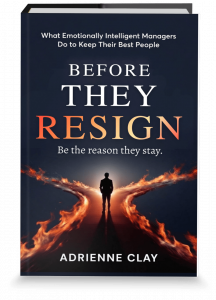 A navy blue book titled ‘Before They Resign’ by Adrienne Clay, with an image of a person standing at a crossroads formed by two glowing fire paths, symbolizing leadership decisions.