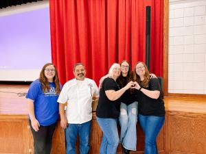 Mariah Dykes, Business Education Teacher at Glen Rose High School, with Chef Serge Krikorian, Michelle Read, Katelyn Reisma, and Leah Seale of Vibrant Occasions Catering following their heart leadership presentation to Glen Rose students.