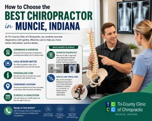 Chiropractor in Muncie Indiana performing consultation with X-rays and low-force activator adjustment at Tri-County Clinic
