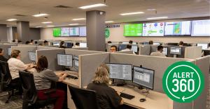 Alert 360 monitoring center full of dispatch agents working at their desks