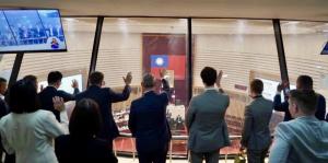 Delegation Observing the Kaohsiung City Council and waving to the members