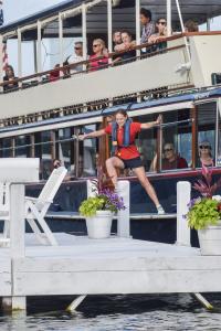 Lake Geneva jumper hops off moving boat onto private pier for mail delivery