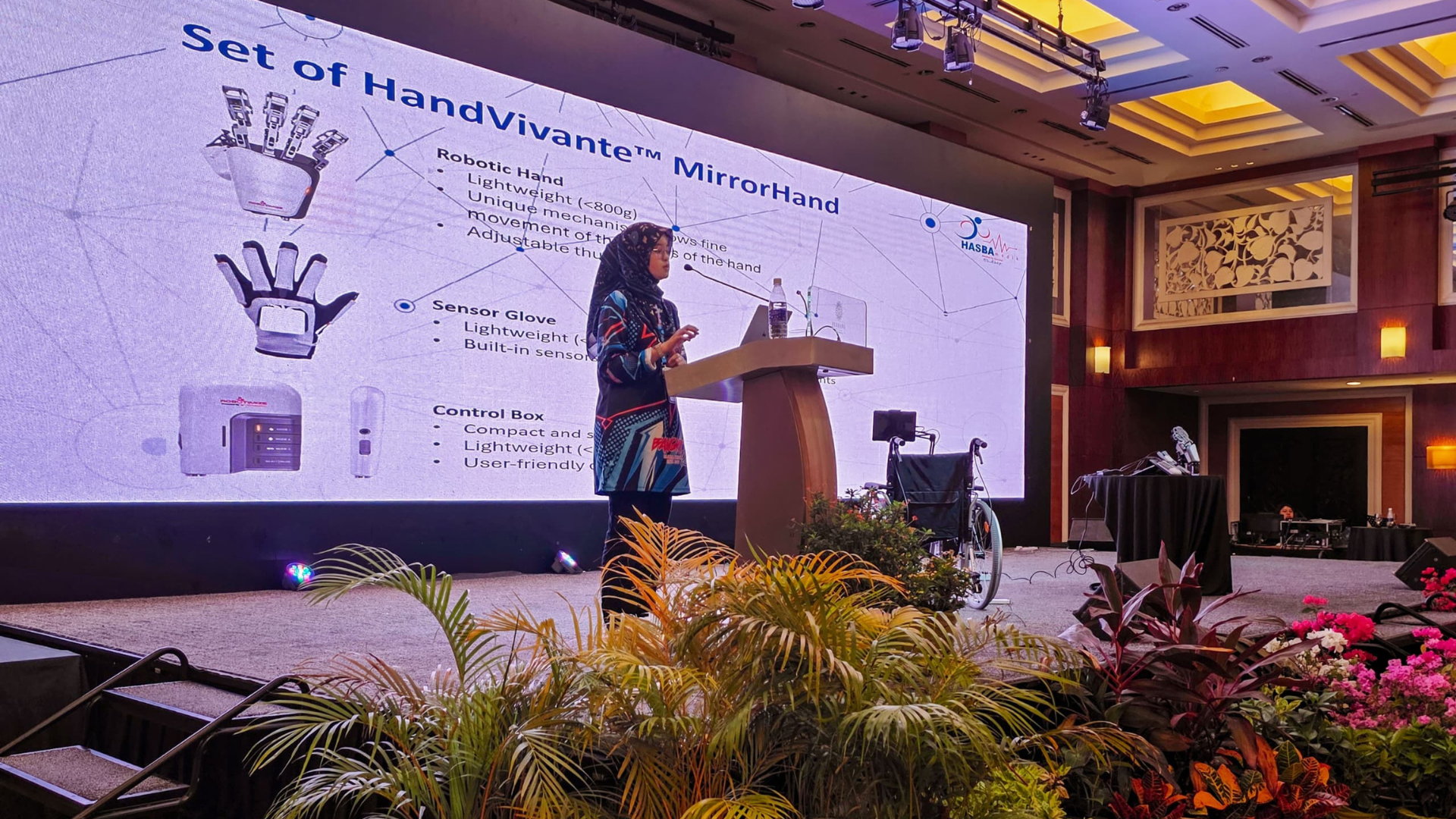 Hasba Medik representative on stage at MOTNC 2026 introducing HandVivante.