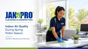 Commercial cleaning specialist disinfecting a Memphis office desk during spring pollen season.
