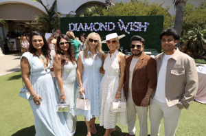 2026 Sold-Out Miracles in Bloom Tea Presented by Diamond Wish  (LEFT TO RIGHT THE PEOPLE POSE IN FRONT OF THE DIAMOND WISH ACTIVATION): Nehal Zaveri, Harshi Zaveri, Autumn Strier, Gretchen Rossi, Ujay Zaveri, Ishaan Zaveri.