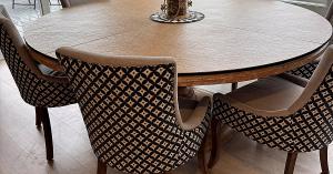 Custom round dining table pad by Table Pads Pro — heat resistant, water resistant, family owned since 1980