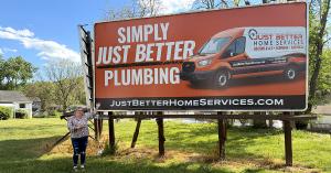 Just Better Home Services Billboard pictured with a recent contestant