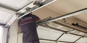 Garage Door Technician Fixes Garage