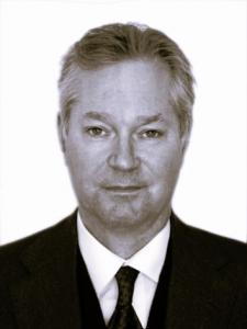 Richard Spooner's headshot image in black and white.