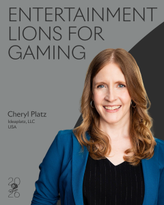 Cheryl Platz, a blonde woman wearing a blue blazer, against an official backdrop that says "entertainment lions for gaming" with the Cannes Lions logo.