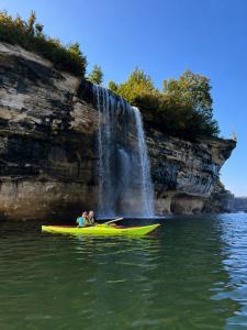 Kayakers at Spray Falls along the Pictured Rocks National Lakeshore.
