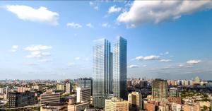 Top Team Window Cleaning signs contract at The Journal, a twin tower residential landmark in Jersey City