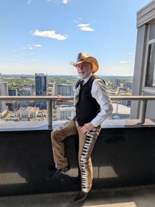 Howard Wiggins overlooking the Nashville skyline on the day of his billboard reveal Photo Credit: ©BrianSebastian/MovieReviewsAndMore