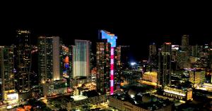 Coronavirus Emergency Salute to Public Servants: 150-foot-tall by 300-foot-wide field of fluttering five-pointed stars and 693-foot glowing vertical stream of red and white stripes will illuminate nightly on Paramount Miami Worldcenter