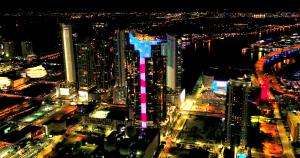 Coronavirus Crisis: Paramount Miami Worldcenter Tower Shines Stars & Stripes As Patriotic Salute to Public Servants