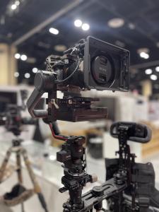 Professional video production equipment including 4K cinema camera and lighting setup for corporate video shoot