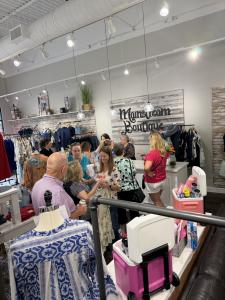 Shoppers at the Grand Re-Opening Event of Mainstream Boutique Saint Johns