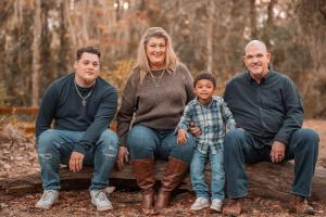 Photo of the new owner of Mainstream Boutique Saint Johns and her family
