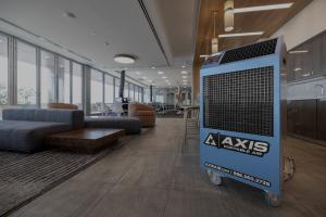 A blue Axis Portable Air rental cooling unit