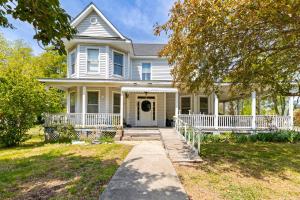 3,440± sf. and features a kitchen, living room, dining room, main floor primary suite w/dual closets and attic.  1/4 wrap-around covered porch.  Soaring ceilings; original hardwood floors; wide trim; built-in cabinetry; new roof in 2019 (approx.).
