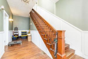 3,440± sf. and features a kitchen, living room, dining room, main floor primary suite w/dual closets and attic.  1/4 wrap-around covered porch.  Soaring ceilings; original hardwood floors; wide trim; built-in cabinetry; new roof in 2019 (approx.).