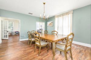 3,440± sf. and features a kitchen, living room, dining room, main floor primary suite w/dual closets and attic.  1/4 wrap-around covered porch.  Soaring ceilings; original hardwood floors; wide trim; built-in cabinetry; new roof in 2019 (approx.).