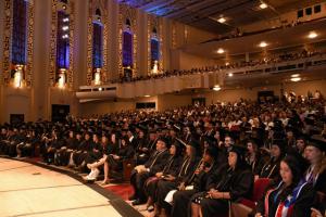 Graduates seated in commencement auditorium