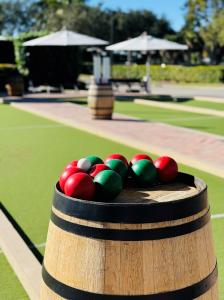 The Bocce Garden at The Club at Mediterra offers three Har-Tru clay courts, shaded seating areas and a nearby Bocce Bar designed for social play and gatherings.