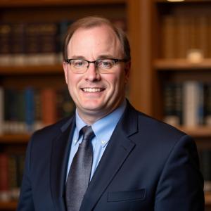 Professional headshot of Eric Shepardson