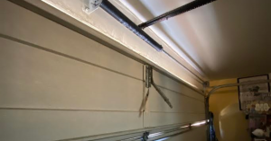 The storefront and service vehicles for Next Hour Garage Door Repair located at 19410 Golden Valley Rd, Santa Clarita, CA 91387.