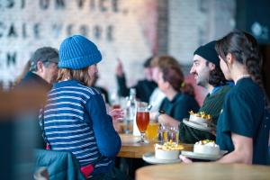 Tasting poutine on the Mile End Food Tour in Montreal with Secret Food Tours