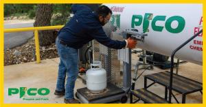 Photo of technician filling a 20-pound propane cylinder at a Pico Propane and Fuels tank.