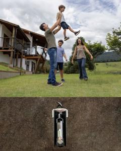 This is a split underground view of the Safe buried, with a family on top at ground level