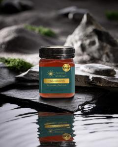 Australian Wildflower Dwutta (Blackbutt) TA35+ amoungst rocks in a reflection pool