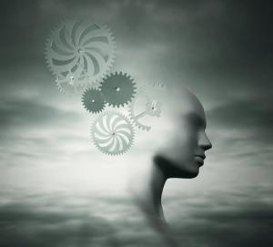photo of sketch of the head of a man in grey tones with "gears" around the head signifying fixing the mind