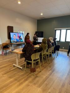 Refugee women in Salt Lake City learning about their driving training program